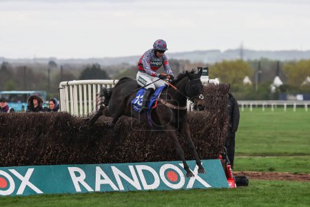 Photo for Sans Bruit ridden by Bryony Frost clears the fence during 4.40pm The Close Brothers Red Rum Handicap Steeple Chase (Class 1) during the Randox Grand National 2024 Opening Day at Aintree Racecourse, Liverpool, United Kingdom, 11th April 202 - Royalty Free Image