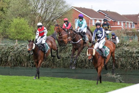 Photo for Bennys King ridden by Mr Sean O'Connor jumps over Beechers brook during the 4.05pm The Randox Foxhunters Open Hunters Steeple Chaseduring the Randox Grand National 2024 Opening Day at Aintree Racecourse, Liverpool, United Kingdom, 11th April 2024 - Royalty Free Image