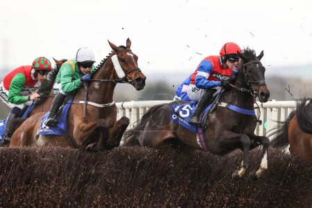 Photo for Mayhem Mya  ridden by Bryan Carver  clears the fence on the first lap of the 4.40pm The Close Brothers Red Rum Handicap Steeple Chase (Class 1) during the Randox Grand National 2024 Opening Day at Aintree Racecourse, Liverpool, United Kingdom, 11th A - Royalty Free Image