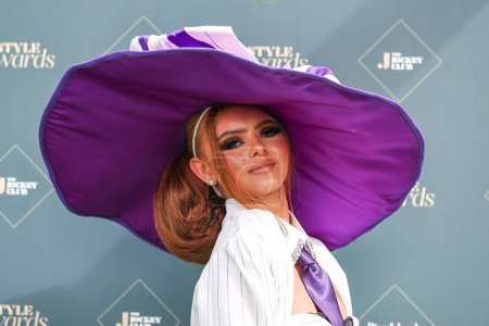 Photo for Racegoers arrive on ladies day during the The Randox Grand National 2024 Ladies Day at Aintree Racecourse, Liverpool, United Kingdom, 12th April 202 - Royalty Free Image