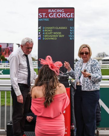 Photo for A Racegoers places during the The Randox Grand National 2024 Ladies Day at Aintree Racecourse, Liverpool, United Kingdom, 12th April 202 - Royalty Free Image