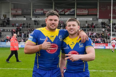 Photo for Joe Philbin of Warrington Wolves celebrates with Danny Walker of Warrington Wolves after the Betfred Challenge Cup Quarter Final match St Helens vs Warrington Wolves at Totally Wicked Stadium, St Helens, United Kingdom, 14th April 202 - Royalty Free Image