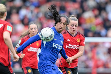 Photo for Mayra Ramrez of Chelsea Women battles for the ball with Ella Toone of Manchester United Women, during Adobe Women's FA Cup Semi-Final match Manchester United Women vs Chelsea FC Women at Leigh Sports Village, Leigh, United Kingdom, 14th April 2024 - Royalty Free Image