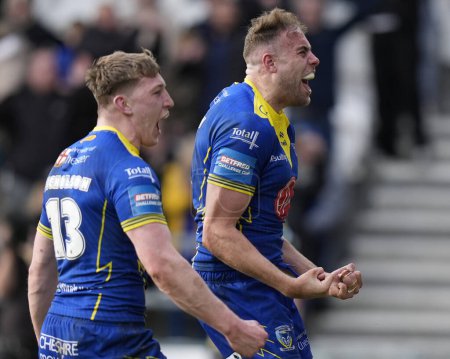 Photo for James Harrison of Warrington Wolves celebrates scoring a try during the Betfred Challenge Cup Quarter Final match St Helens vs Warrington Wolves at Totally Wicked Stadium, St Helens, United Kingdom, 14th April 202 - Royalty Free Image