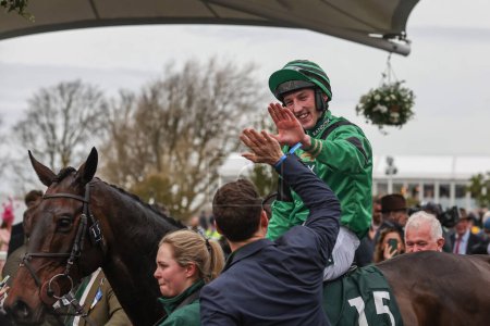 Photo for Ciaran Gethnigs celebrates winning the 4.05pm The Randox Supports Race Against Dementia Topham Chase (Grade 3) during the The Randox Grand National 2024 Ladies Day at Aintree Racecourse, Liverpool, United Kingdom, 12th April 202 - Royalty Free Image