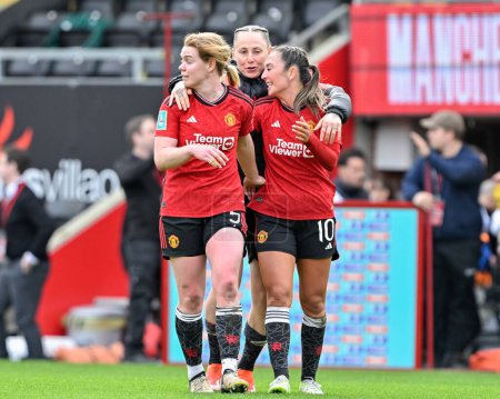 Photo for Aoife Mannion of Manchester United Women, Katie Zelem of Manchester United Women and Leah Galton of Manchester United Women celebrate the full time result, during the Adobe Women's FA Cup Semi-Final match Manchester United Women vs Chelsea FC Women a - Royalty Free Image