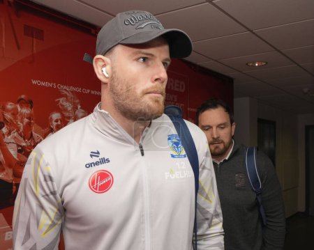 Photo for Lachlan Fitzgibbon of Warrington Wolves arrives at the stadium before the Betfred Challenge Cup Quarter Final match St Helens vs Warrington Wolves at Totally Wicked Stadium, St Helens, United Kingdom, 14th April 202 - Royalty Free Image