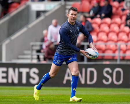 Photo for Stefan Ratchford of Warrington Wolves warms up before the Betfred Challenge Cup Quarter Final match St Helens vs Warrington Wolves at Totally Wicked Stadium, St Helens, United Kingdom, 14th April 202 - Royalty Free Image