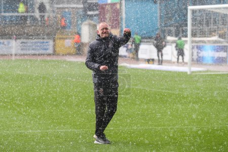 Photo for Neil Critchley manager of Blackpool celebrates his teams win after the Sky Bet League 1 match Carlisle United vs Blackpool at Brunton Park, Carlisle, United Kingdom, 13th April 202 - Royalty Free Image