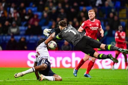 Photo for Marko Maroi of Shrewsbury Town punches the ball out of danger during the Sky Bet League 1 match Bolton Wanderers vs Shrewsbury Town at Toughsheet Community Stadium, Bolton, United Kingdom, 16th April 2024 - Royalty Free Image