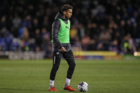 Photo for Theo Chapman of Barnsley warming up at half time during the Sky Bet League 1 match Portsmouth vs Barnsley at Fratton Park, Portsmouth, United Kingdom, 16th April 202 - Royalty Free Image