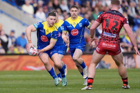 Photo for George Williams of Warrington Wolves sets to pass during the Betfred Super League Round 8 match Warrington Wolves vs Leigh Leopards at Halliwell Jones Stadium, Warrington, United Kingdom, 20th April 202 - Royalty Free Image