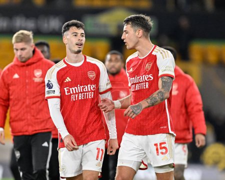 Photo for Gabriel Martinelli  of Arsenal speaks with Jakub Kiwior of Arsenal at full time, during the Premier League match Wolverhampton Wanderers vs Arsenal at Molineux, Wolverhampton, United Kingdom, 20th April 202 - Royalty Free Image