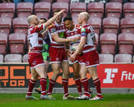 Photo for Bevan French of Wigan Warriors celebrates his try during the Betfred Super League Round 8 match Wigan Warriors vs Castleford Tigers at DW Stadium, Wigan, United Kingdom, 19th April 202 - Royalty Free Image
