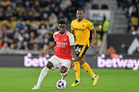 Téléchargez les photos : Bukayo Saka d'Arsenal en action, lors du match de Premier League Wolverhampton Wanderers vs Arsenal à Molineux, Wolverhampton, Royaume-Uni, 20 avril 202 - en image libre de droit