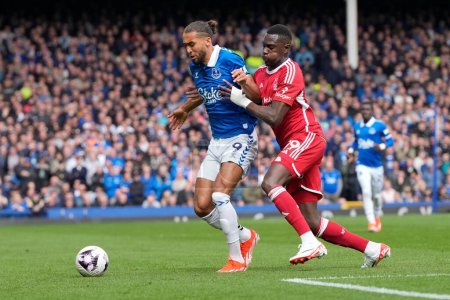 Photo for Moussa Niakhat of Nottingham Forest competes for the ball with Dominic Calvert-Lewin of Everton during the Premier League match Everton vs Nottingham Forest at Goodison Park, Liverpool, United Kingdom, 21st April 2024 - Royalty Free Image