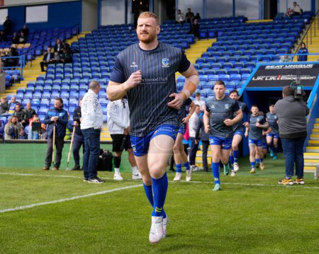 Photo for Joe Bullock of Warrington Wolves runs out to warm up before the Betfred Super League Round 8 match Warrington Wolves vs Leigh Leopards at Halliwell Jones Stadium, Warrington, United Kingdom, 20th April 202 - Royalty Free Image