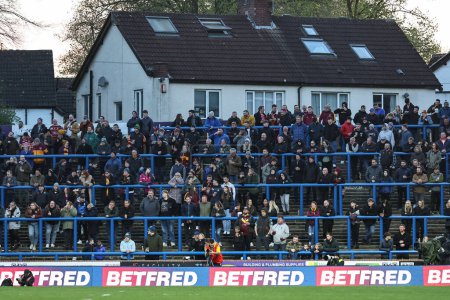 Photo for Huddersfield fans in the away end during the Betfred Super League Round 8 match Leeds Rhinos vs Huddersfield Giants at Headingley Stadium, Leeds, United Kingdom, 19th April 202 - Royalty Free Image