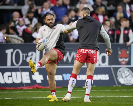 Photo for Konrad Hurrell of St. Helens and Curtis Sironen of St. Helens warm up before the Betfred Super League  Round 8 match St Helens vs Hull FC at Totally Wicked Stadium, St Helens, United Kingdom, 19th April 202 - Royalty Free Image