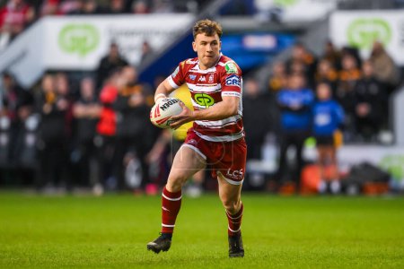 Photo for Harry Smith of Wigan Warriors makes a break during the Betfred Super League Round 8 match Wigan Warriors vs Castleford Tigers at DW Stadium, Wigan, United Kingdom, 19th April 202 - Royalty Free Image
