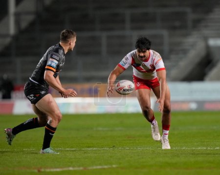 Photo for James Bell of St. Helens fumbles the ball during the Betfred Super League  Round 8 match St Helens vs Hull FC at Totally Wicked Stadium, St Helens, United Kingdom, 19th April 202 - Royalty Free Image