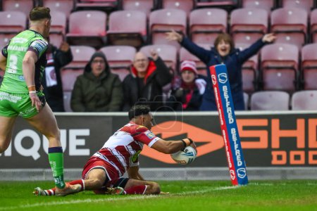Photo for Bevan French of Wigan Warriors scores a try during the Betfred Super League Round 8 match Wigan Warriors vs Castleford Tigers at DW Stadium, Wigan, United Kingdom, 19th April 202 - Royalty Free Image