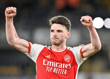 Photo for Declan Rice of Arsenal celebrates the full time result, during the Premier League match Wolverhampton Wanderers vs Arsenal at Molineux, Wolverhampton, United Kingdom, 20th April 202 - Royalty Free Image