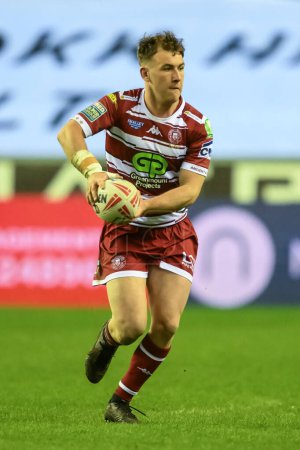 Photo for Harry Smith of Wigan Warriors makes a break during the Betfred Super League Round 8 match Wigan Warriors vs Castleford Tigers at DW Stadium, Wigan, United Kingdom, 19th April 202 - Royalty Free Image