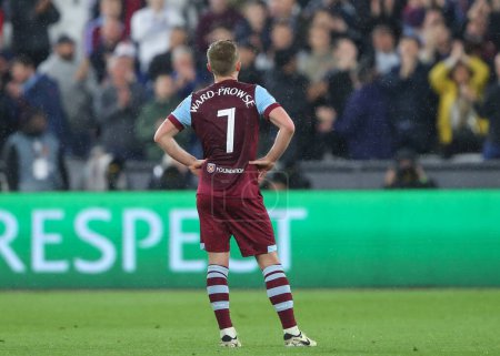 Photo for James Ward-Prowse of West Ham United reacts at full time, during the UEFA Europa League Quarter-Final match West Ham United vs Bayer 04 Leverkusen at London Stadium, London, United Kingdom, 18th April 202 - Royalty Free Image