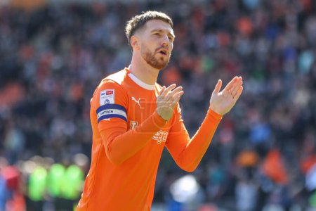 Photo for James Husband of Blackpool applauds the fans before the game during the Sky Bet League 1 match Blackpool vs Barnsley at Bloomfield Road, Blackpool, United Kingdom, 20th April 202 - Royalty Free Image