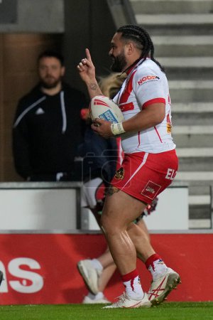 Photo for Konrad Hurrell of St. Helens celebrates after he scores a try during the Betfred Super League  Round 8 match St Helens vs Hull FC at Totally Wicked Stadium, St Helens, United Kingdom, 19th April 202 - Royalty Free Image