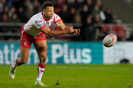 Photo for Moses Mbye of St. Helens passes the ball during the Betfred Super League  Round 8 match St Helens vs Hull FC at Totally Wicked Stadium, St Helens, United Kingdom, 19th April 202 - Royalty Free Image