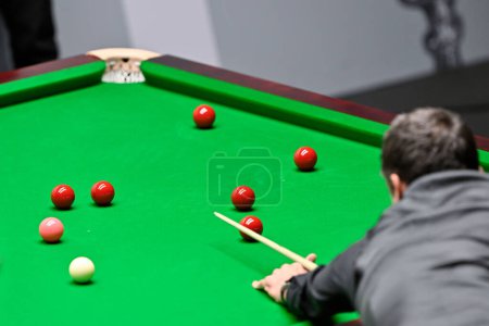 Photo for Ronnie O'Sullivan takes a shot, during the Cazoo World Championships 2024 at Crucible Theatre, Sheffield, United Kingdom, 28th April 202 - Royalty Free Image