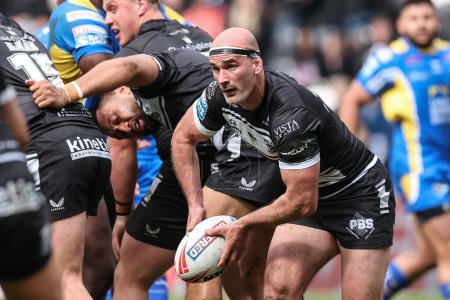 Photo for Danny Houghton Hull FC offloads during the Betfred Super League Round 9 match Hull FC vs Leeds Rhinos at MKM Stadium, Hull, United Kingdom, 28th April 202 - Royalty Free Image