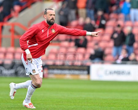 Photo for Ollie Palmer of Wrexham warms up ahead of the match, during the Sky Bet League 2 match Wrexham vs Stockport County at SToK Cae Ras, Wrexham, United Kingdom, 27th April 202 - Royalty Free Image