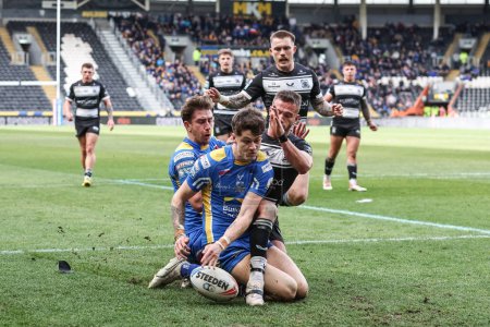 Photo for Riley Lumb of Leeds Rhinos goes over for his second  try to make it 6-10 during the Betfred Super League Round 9 match Hull FC vs Leeds Rhinos at MKM Stadium, Hull, United Kingdom, 28th April 202 - Royalty Free Image