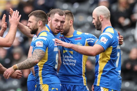 Photo for Cameron Smith of Leeds Rhinos celebrates his try to make it 6-14 during the Betfred Super League Round 9 match Hull FC vs Leeds Rhinos at MKM Stadium, Hull, United Kingdom, 28th April 202 - Royalty Free Image
