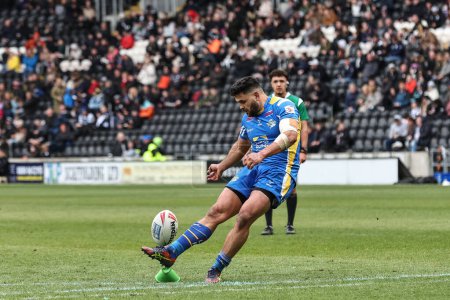 Photo for Rhyse Martin of Leeds Rhinos converts for a goal to make it 6-18 during the Betfred Super League Round 9 match Hull FC vs Leeds Rhinos at MKM Stadium, Hull, United Kingdom, 28th April 202 - Royalty Free Image