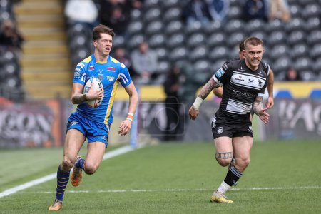 Photo for Riley Lumb of Leeds Rhinos breaks with the ball during the Betfred Super League Round 9 match Hull FC vs Leeds Rhinos at MKM Stadium, Hull, United Kingdom, 28th April 202 - Royalty Free Image