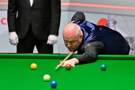 Photo for John Higgins takes a shot, during the Cazoo World Championships 2024 at Crucible Theatre, Sheffield, United Kingdom, 28th April 202 - Royalty Free Image