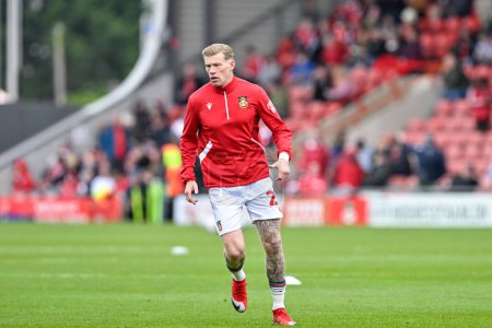 Photo for James McClean of Wrexham warms up ahead of the match, during the Sky Bet League 2 match Wrexham vs Stockport County at SToK Cae Ras, Wrexham, United Kingdom, 27th April 202 - Royalty Free Image