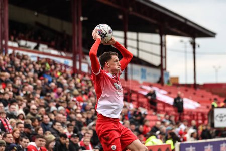 Photo for Mal de Gevigney of Barnsley takes a throw-in during the Sky Bet League 1 match Barnsley vs Northampton Town at Oakwell, Barnsley, United Kingdom, 27th April 2024 - Royalty Free Image