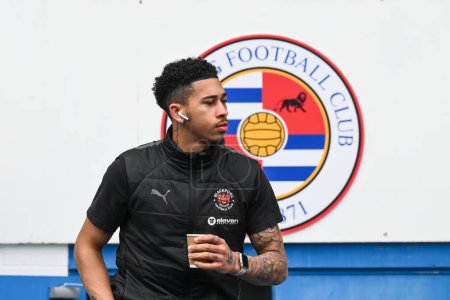 Photo for Jordan Lawrence-Gabriel of Blackpool arrives ahead of the Sky Bet League 1 match Reading vs Blackpool at Select Car Leasing Stadium, Reading, United Kingdom, 27th April 202 - Royalty Free Image