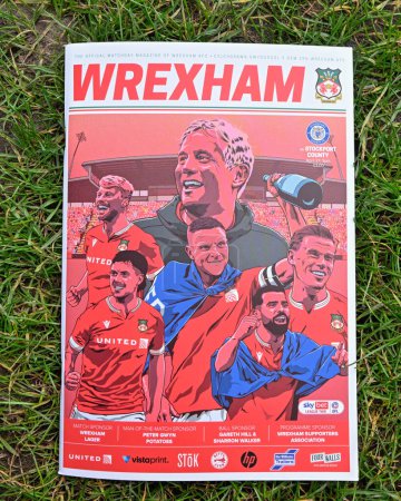 Photo for The match day program pitch side ahead of the Sky Bet League 2 match Wrexham vs Stockport County at SToK Cae Ras, Wrexham, United Kingdom, 27th April 202 - Royalty Free Image