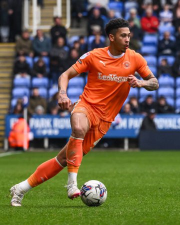 Photo for Jordan Lawrence-Gabriel of Blackpool makes a break with the ball during the Sky Bet League 1 match Reading vs Blackpool at Select Car Leasing Stadium, Reading, United Kingdom, 27th April 202 - Royalty Free Image