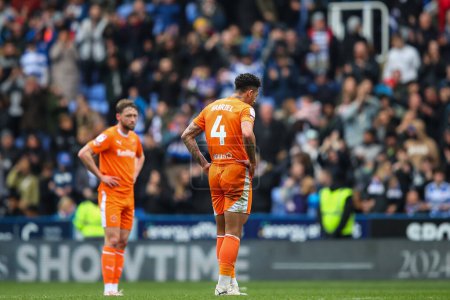 Photo for Jordan Lawrence-Gabriel of Blackpool reacts to his team's loss after the Sky Bet League 1 match Reading vs Blackpool at Select Car Leasing Stadium, Reading, United Kingdom, 27th April 202 - Royalty Free Image