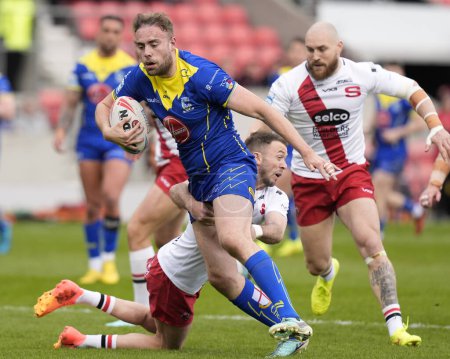 Photo for James Harrison of Warrington Wolves breaks through the Salford Red Devils defence to score a try during the Betfred Super League Round 9 match Salford Red Devils vs Warrington Wolves at Salford Community Stadium, Eccles, United Kingdom, 27th April 20 - Royalty Free Image