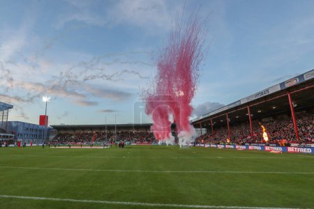 Photo for Pyrotechnics as the teams come out for the game during the Betfred Super League Round 9 match Hull KR vs Wigan Warriors at Sewell Group Craven Park, Kingston upon Hull, United Kingdom, 26th April 202 - Royalty Free Image