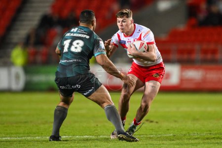 Photo for Jack Welsby of St. Helens in action during the Betfred Super League Round 9 match St Helens vs Huddersfield Giants at Totally Wicked Stadium, St Helens, United Kingdom, 25th April 202 - Royalty Free Image