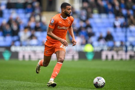 Photo for CJ Hamilton of Blackpool makes a break with the ball during the Sky Bet League 1 match Reading vs Blackpool at Select Car Leasing Stadium, Reading, United Kingdom, 27th April 202 - Royalty Free Image